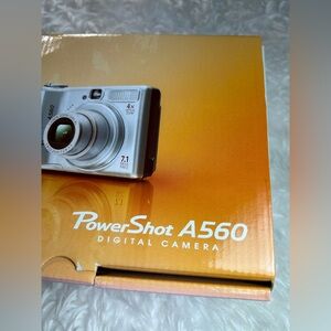 CANON POWER SHOT A560 BOX AND PAPERS DISK ONLY NO CAMERAS